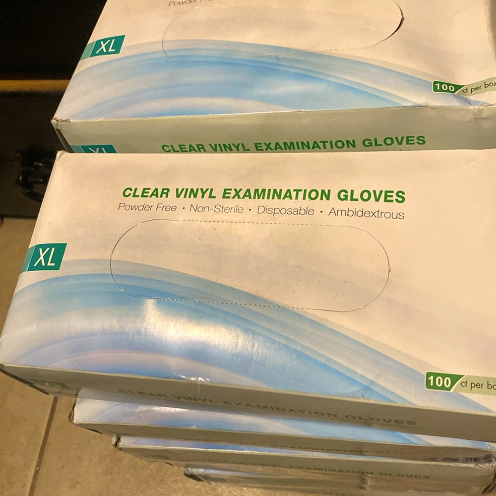 Clear vinyl exam gloves